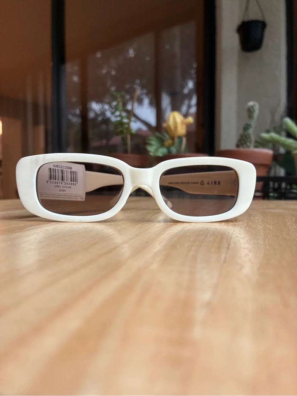 NWT AIRE Ceres Ivory Slim Oval Sunglasses